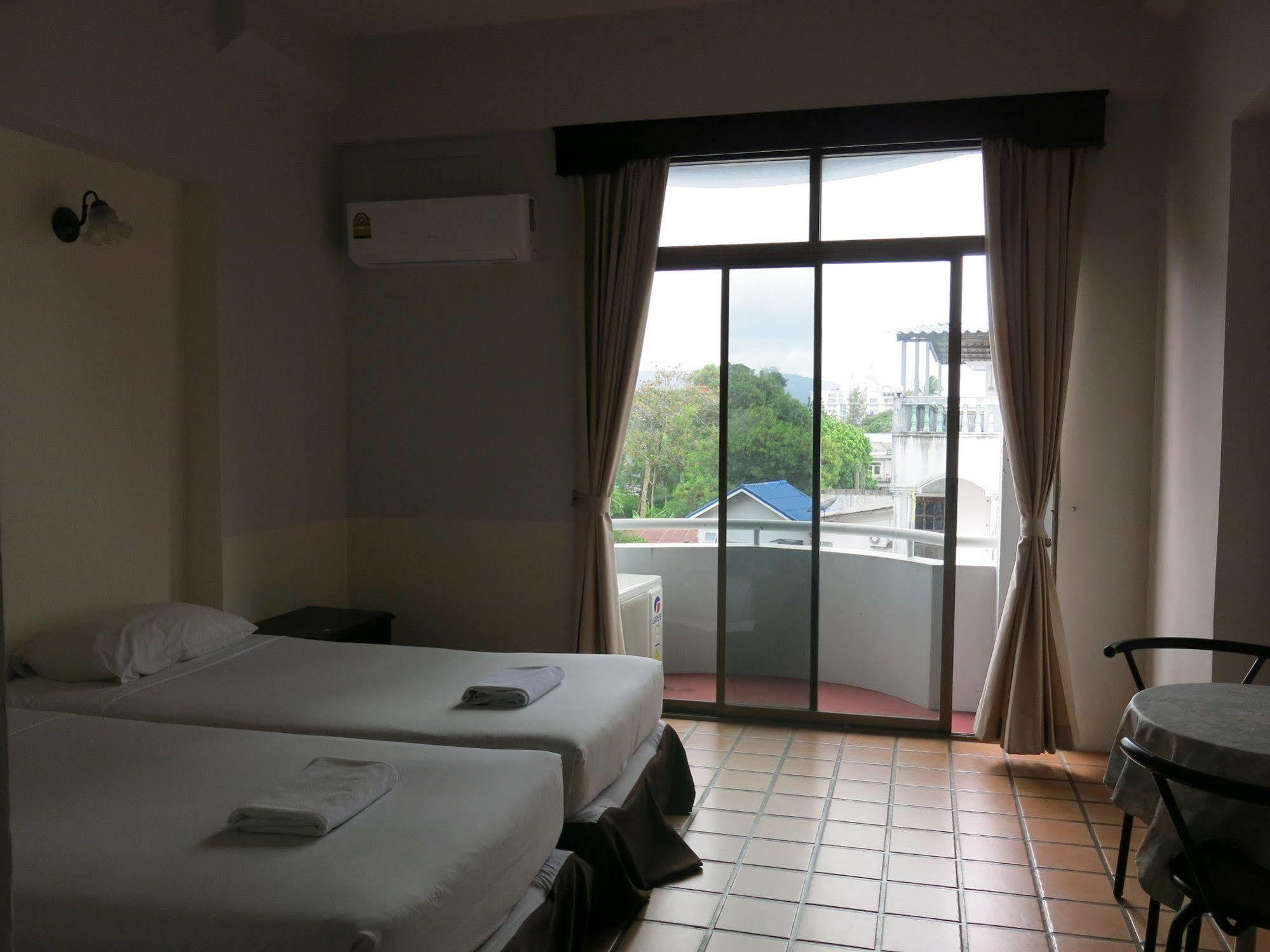 Rome Place Hotel Phuket Esterno foto